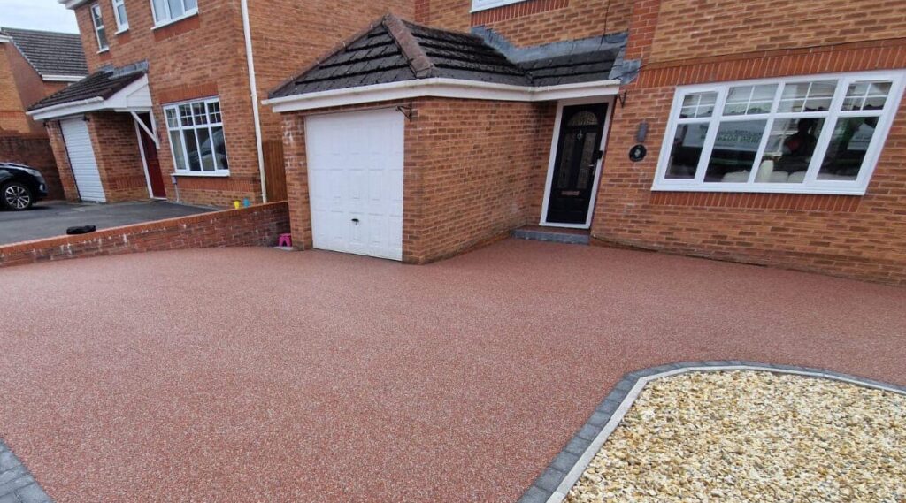 Maintaining Your Resin Bound Driveway a featured red drive