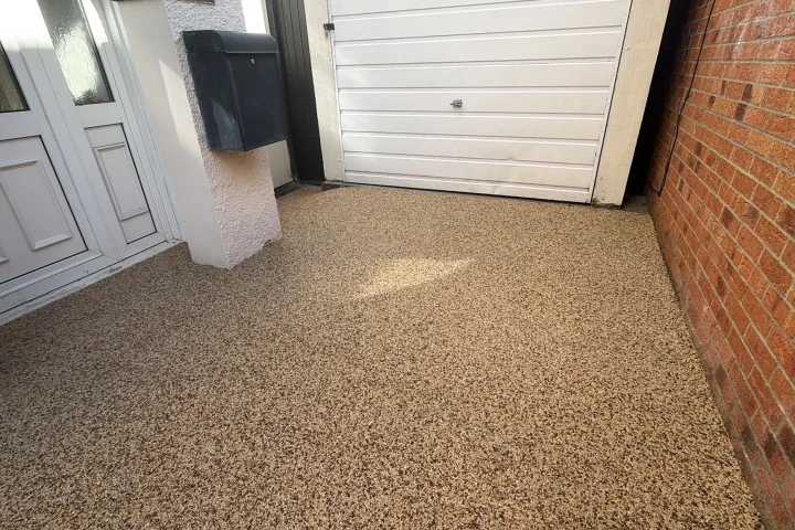 The completed driveway and front garden, framed by the new capped pillar and black block paving border, Rhiwbina, Cardiff 