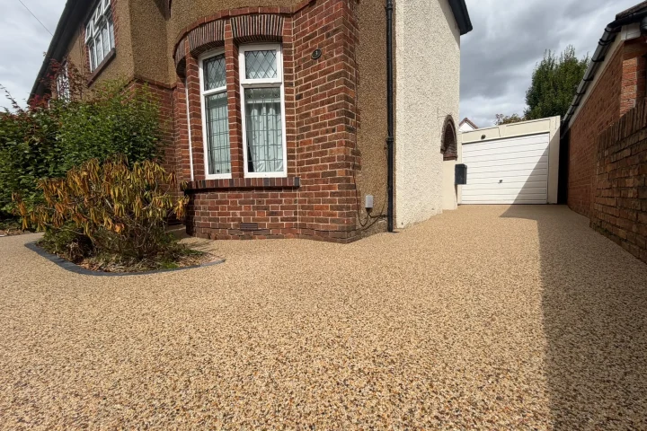 The completed driveway and front garden, framed by the new capped pillar and black block paving border, Rhiwbina, Cardiff 