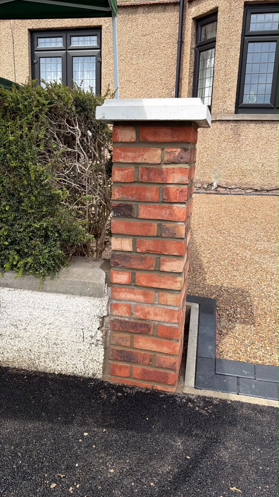 After: the new pillar built and capped with a coping stone